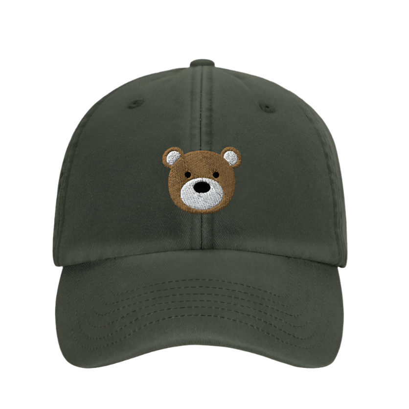Green cap with a bear face embroidery on a white background